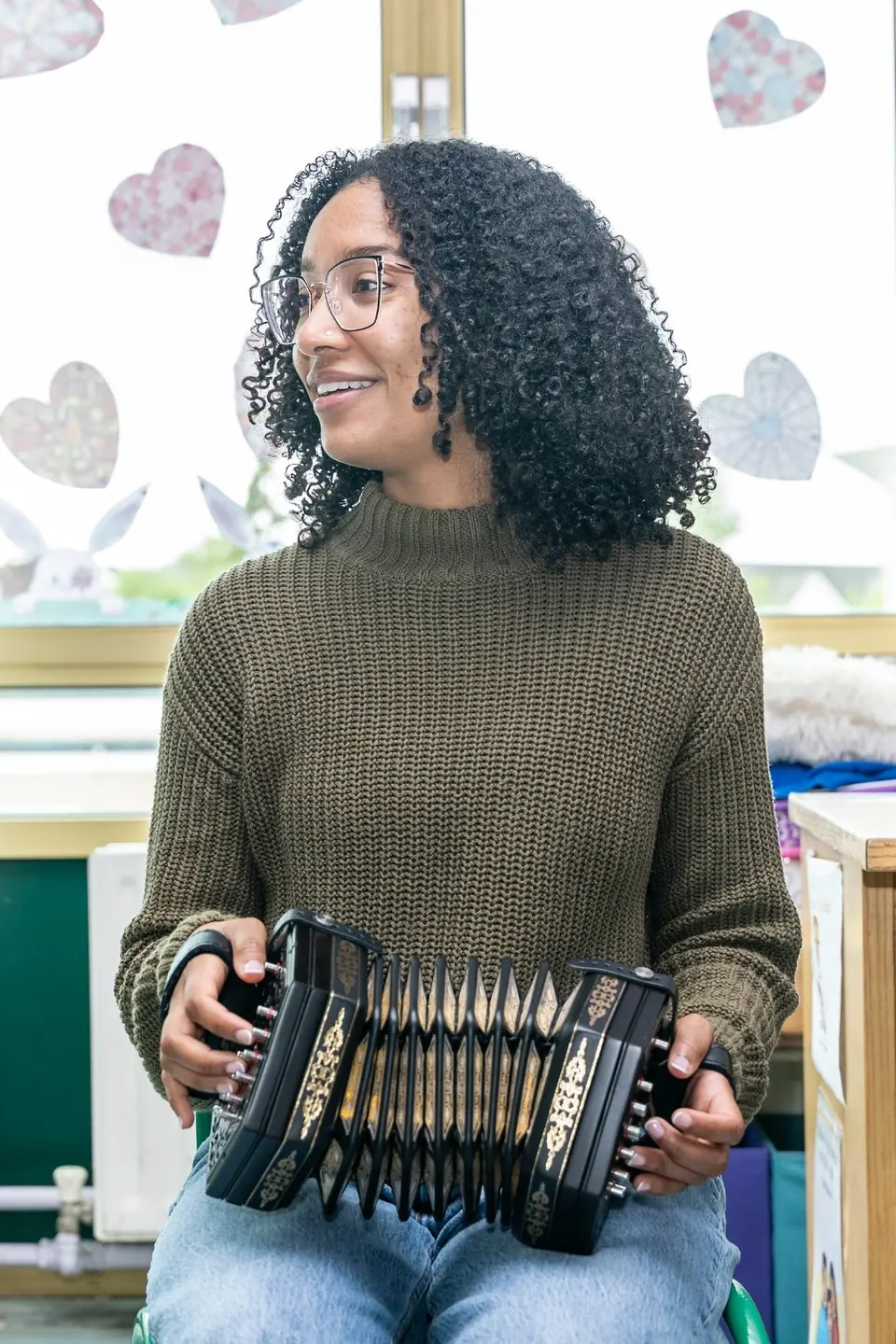 Zohra Coday playing the concertina